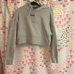 Grey cropped woman’s adidas hoodie